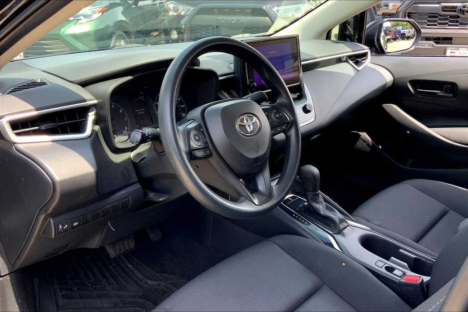 Used 2023 Midnight Black Metallic Toyota LE image 17