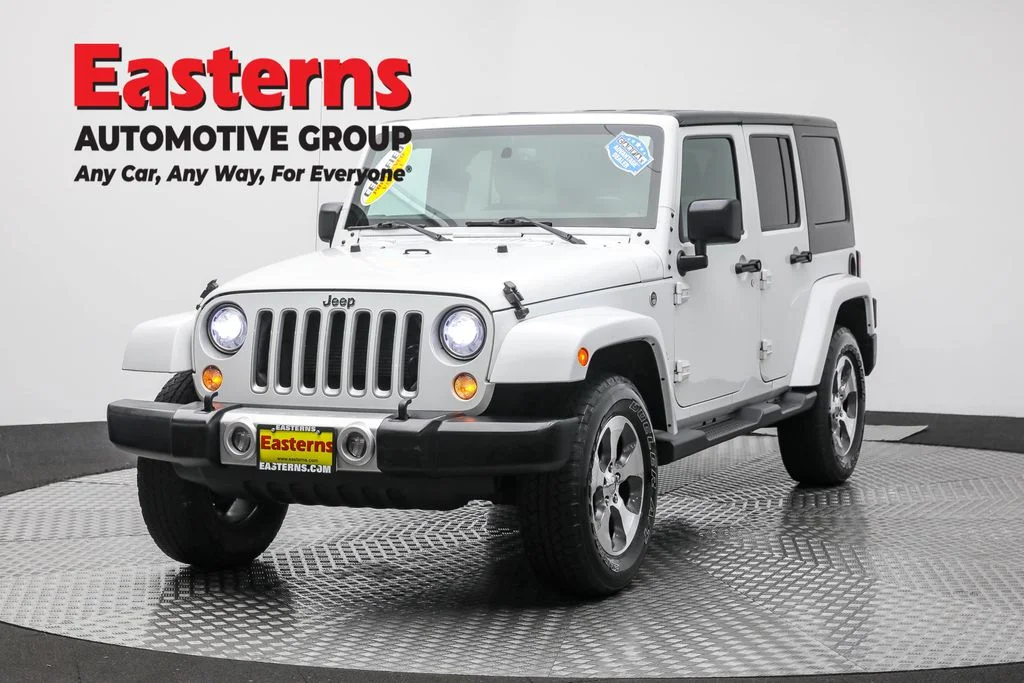 Used 2018 White Jeep Unlimited Sahara image 1