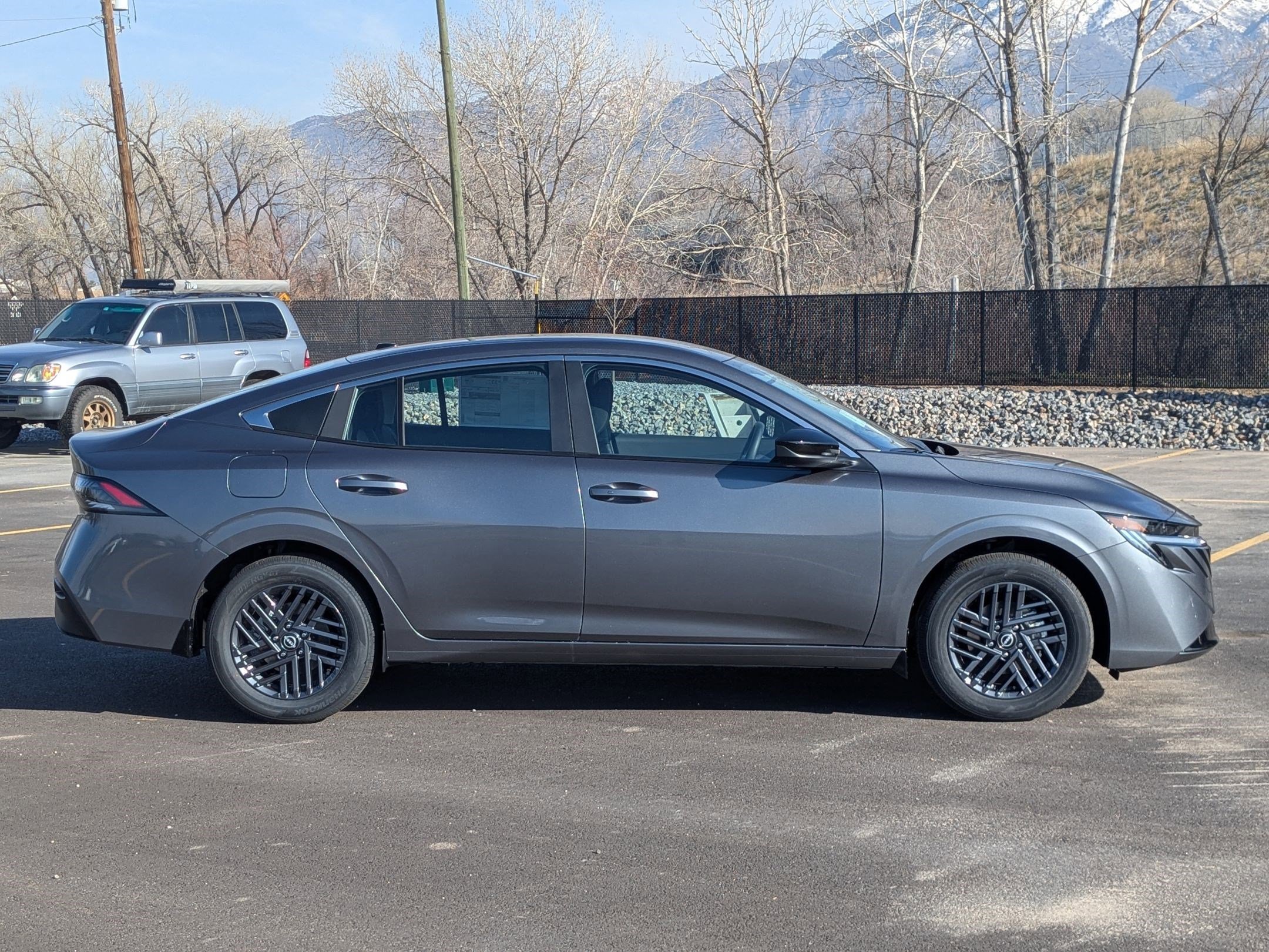 New 2026 Gun Metallic Nissan SV image 2