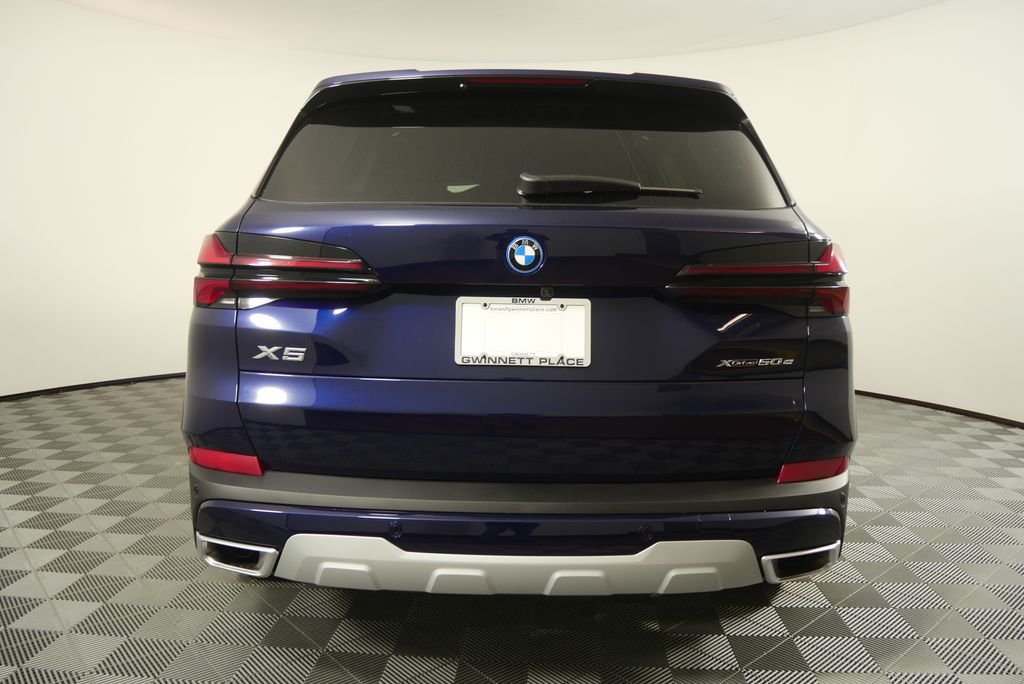 New 2026 Tanzanite Blue II Metallic BMW xDrive50e image 4