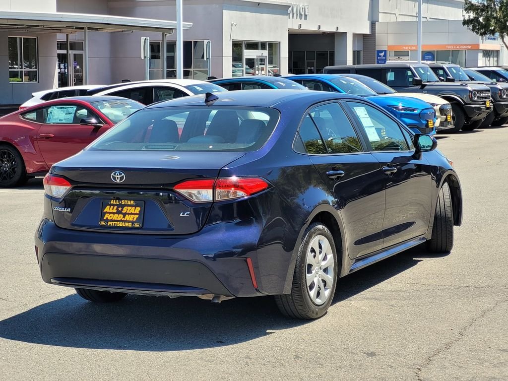 Used 2021 Blue Toyota LE image 4
