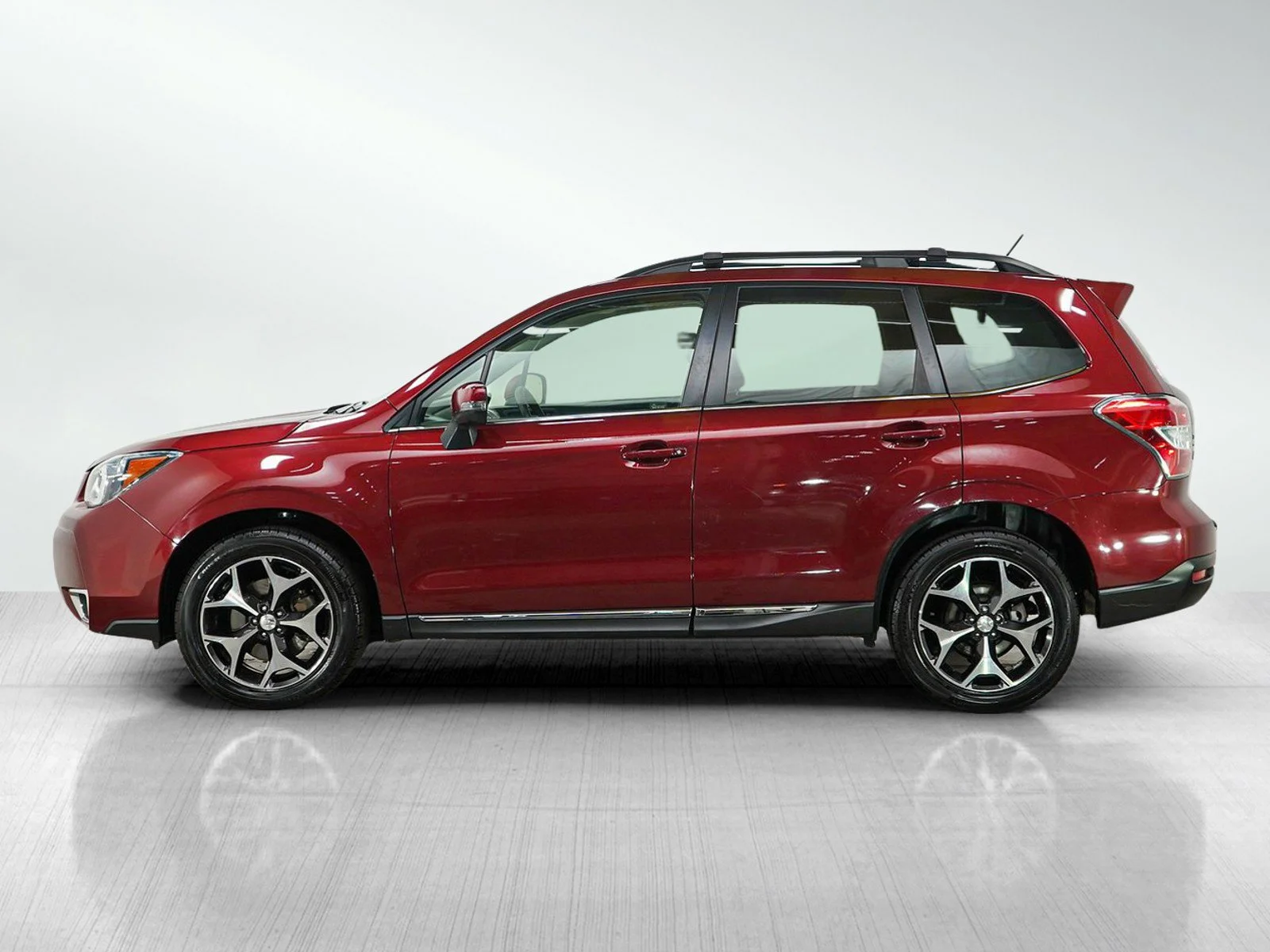 Used 2015 Subaru Forester XT Touring with VIN JF2SJGUC4FH461345 for sale in Burnsville, Minnesota