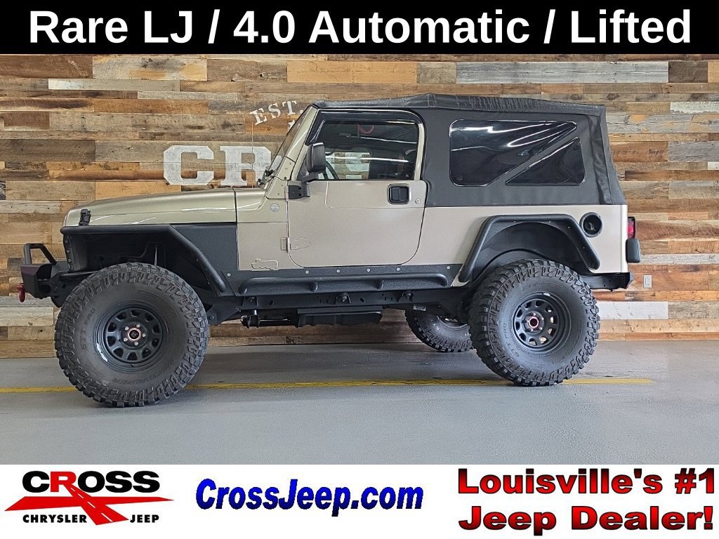 Used 2004 Light Khaki Metallic Jeep Unlimited image 1