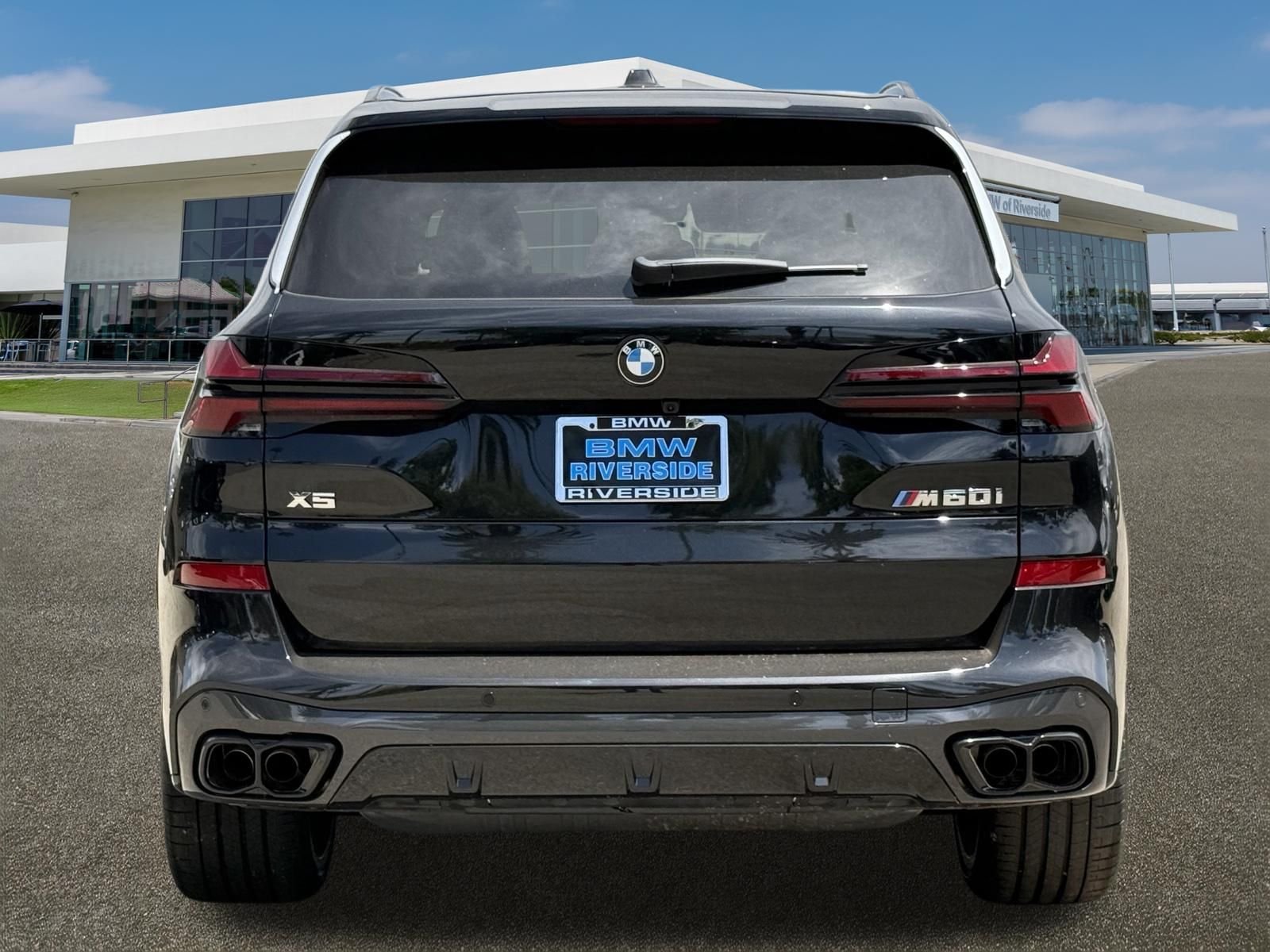 New 2026 Black Sapphire Metallic BMW M60i image 9