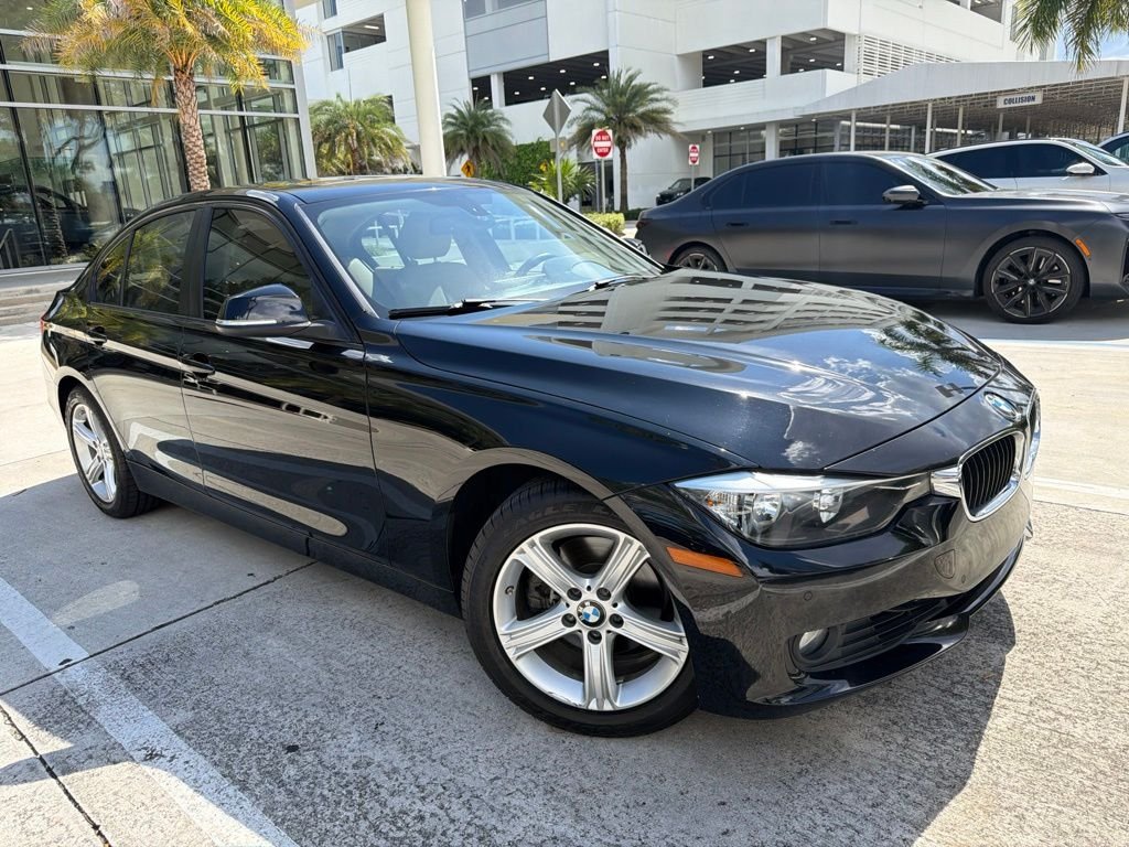 Used 2015 Jet Black BMW 328i image 1