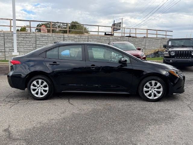 Used 2025 Midnight Black Metallic Toyota LE image 6