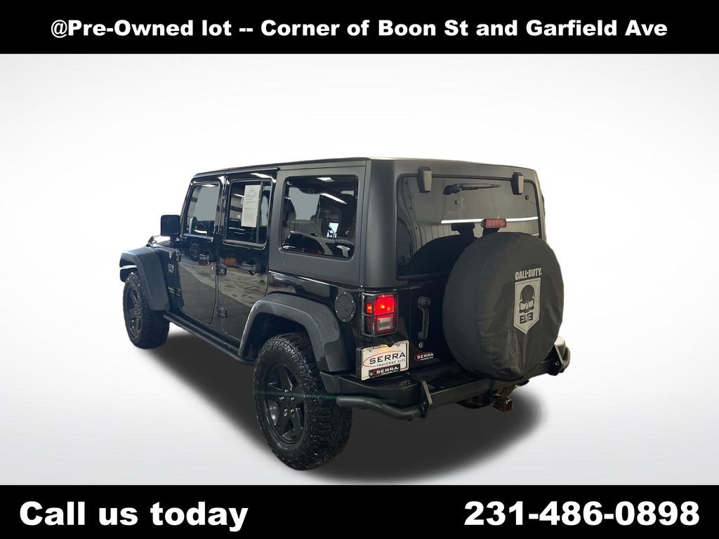 Used 2012 Black Jeep Unlimited Rubicon image 3