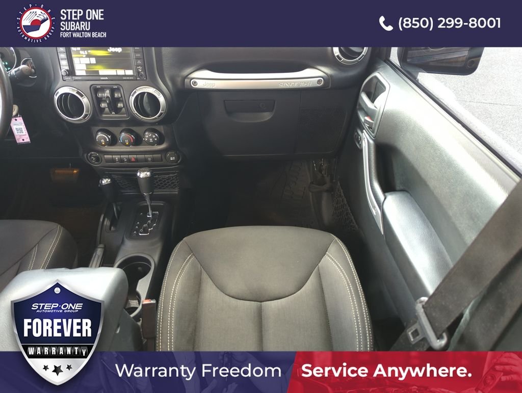 Used 2017 Black Jeep Unlimited Sahara image 16