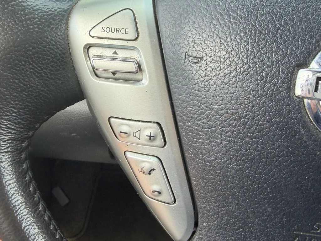 Used 2014 Metallic Peacock Nissan SV image 27