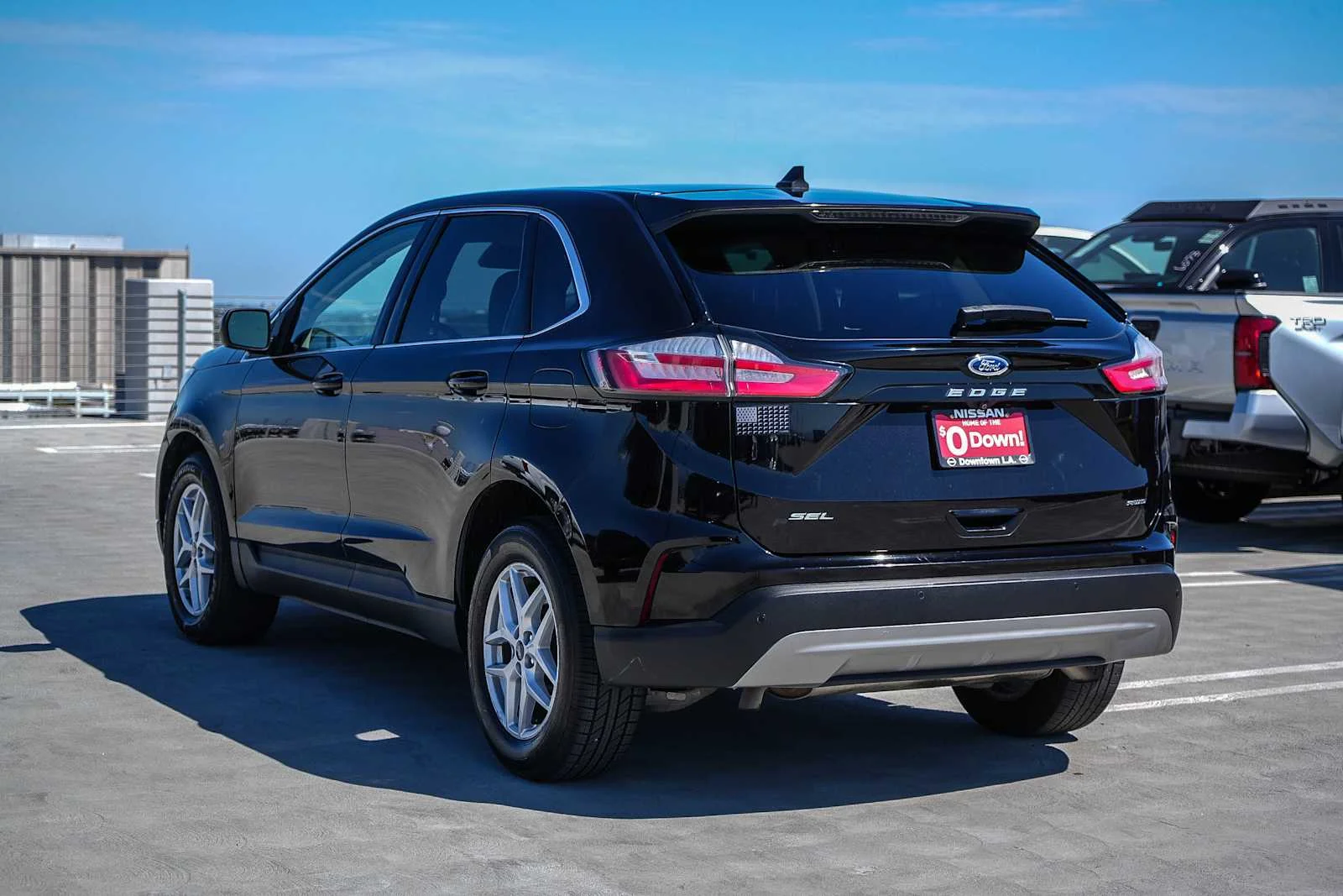 Used 2021 Agate Black Metallic Ford SEL image 9