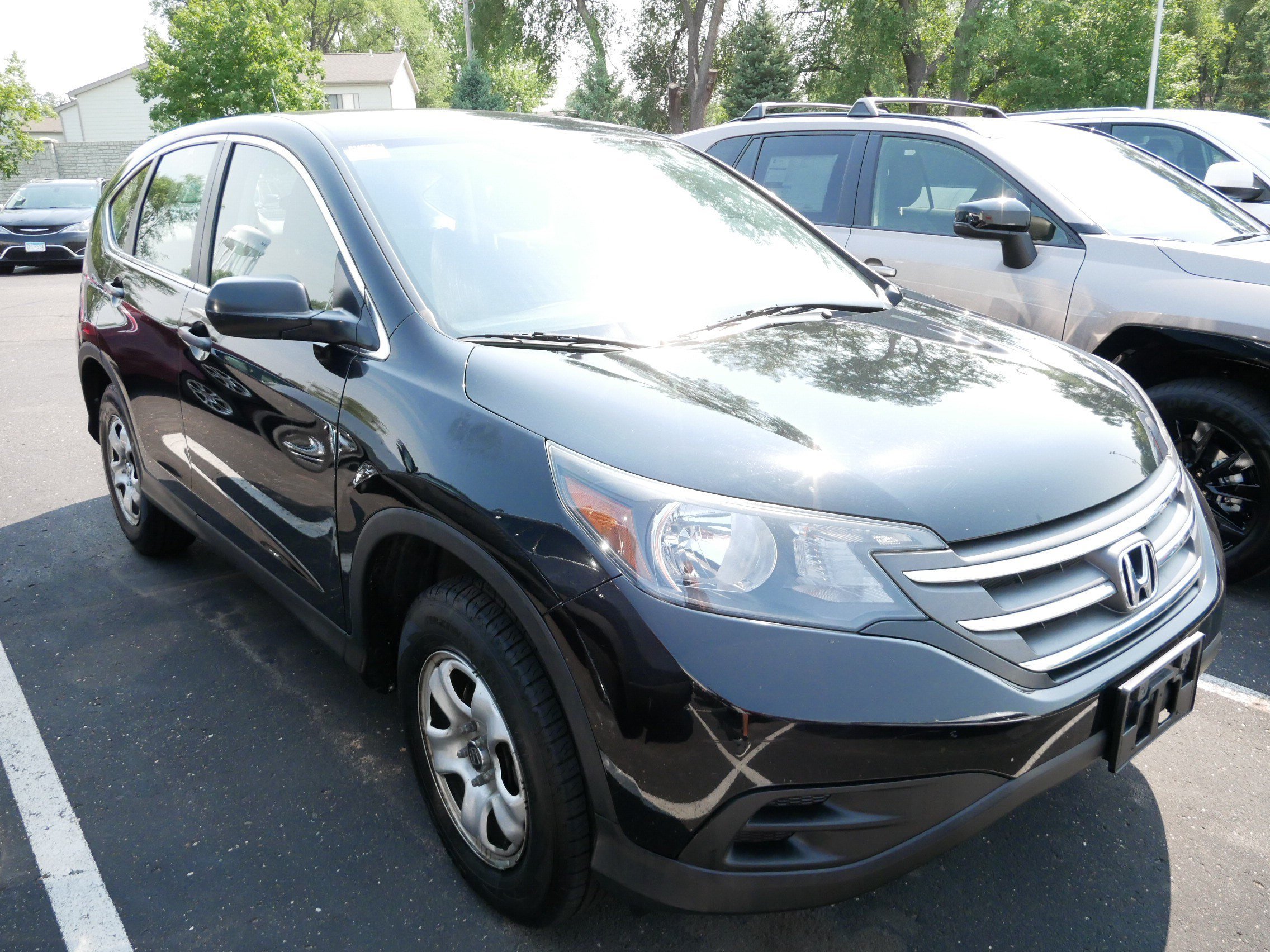 Used 2014 Honda CR-V LX with VIN 2HKRM4H32EH664599 for sale in Brooklyn Center, Minnesota