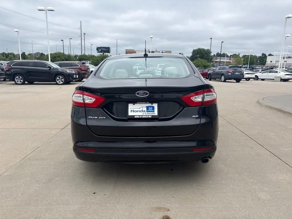Used 2014 Tuxedo Black Metallic Ford SE image 6