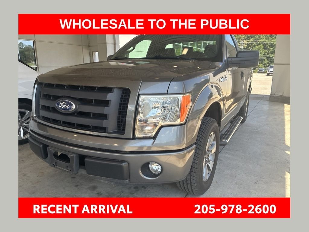 Used 2011 Gray Ford STX image 1