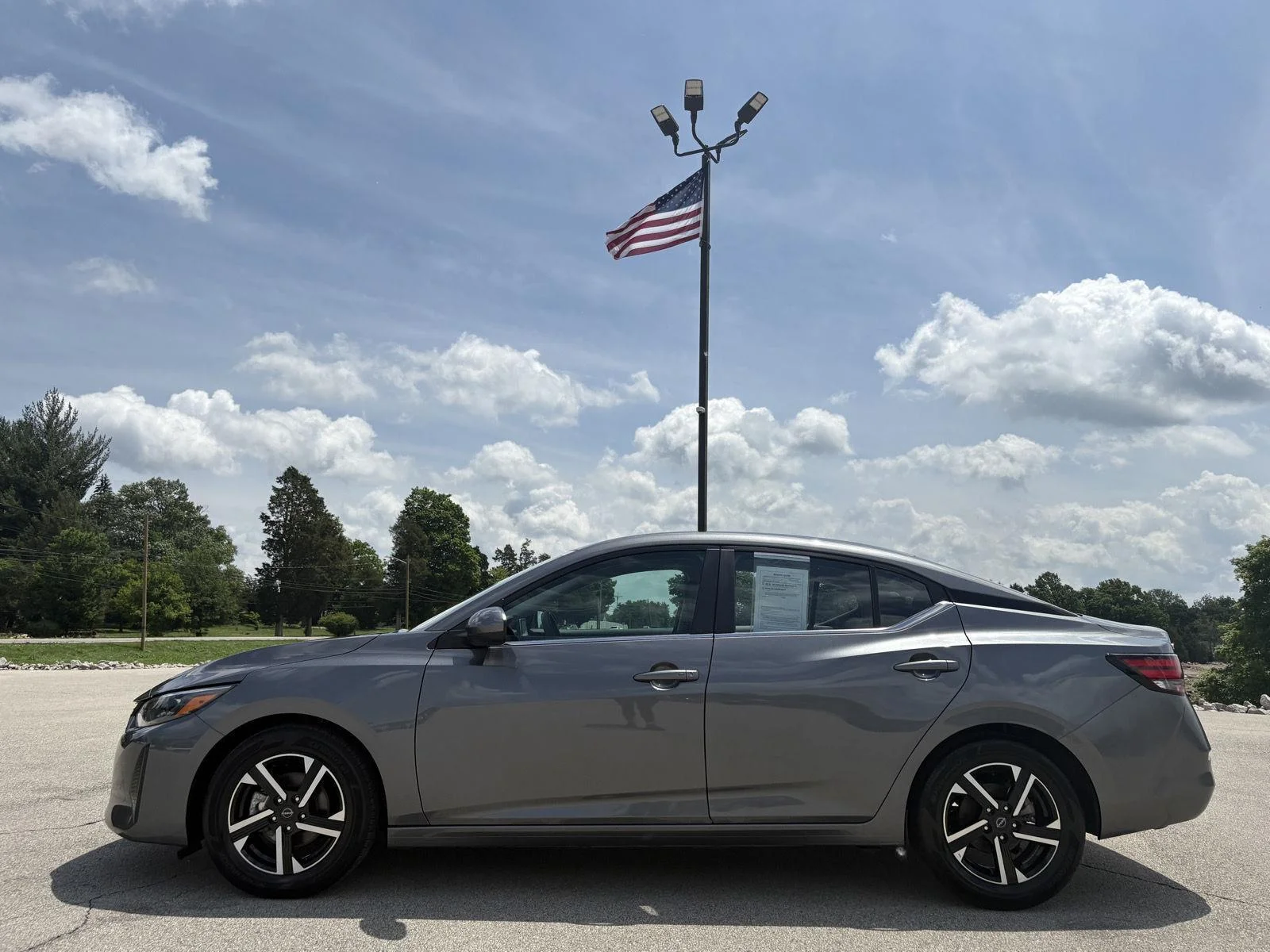 Used 2025 Atlantic Gray Metallic Nissan SV image 3