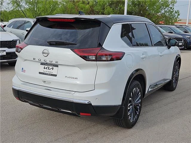 Used 2024 Everest White Pearl Nissan Platinum image 4