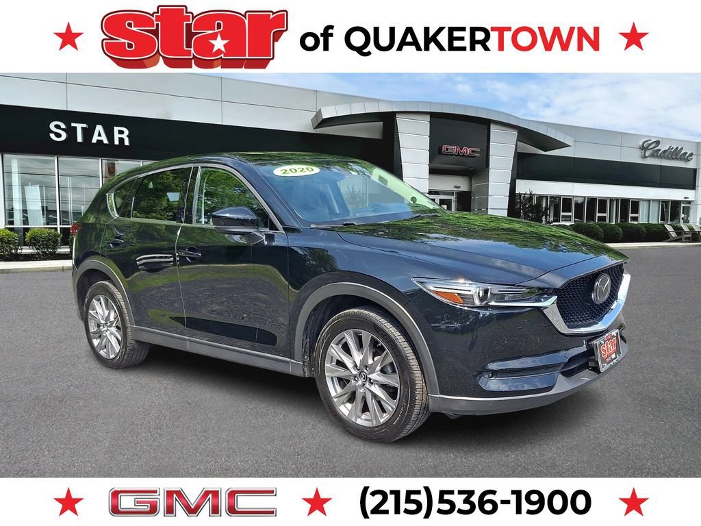 Used 2020 Black Mazda Grand Touring image 1
