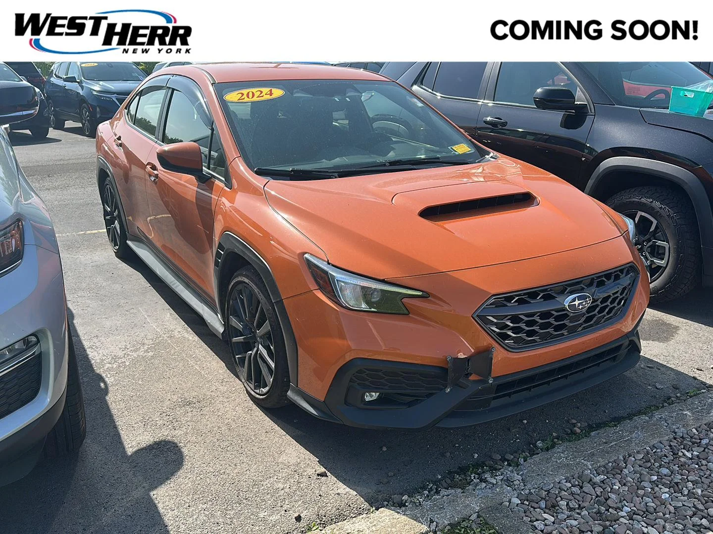 Used 2024 Solar Orange Pearl Subaru Premium image 1