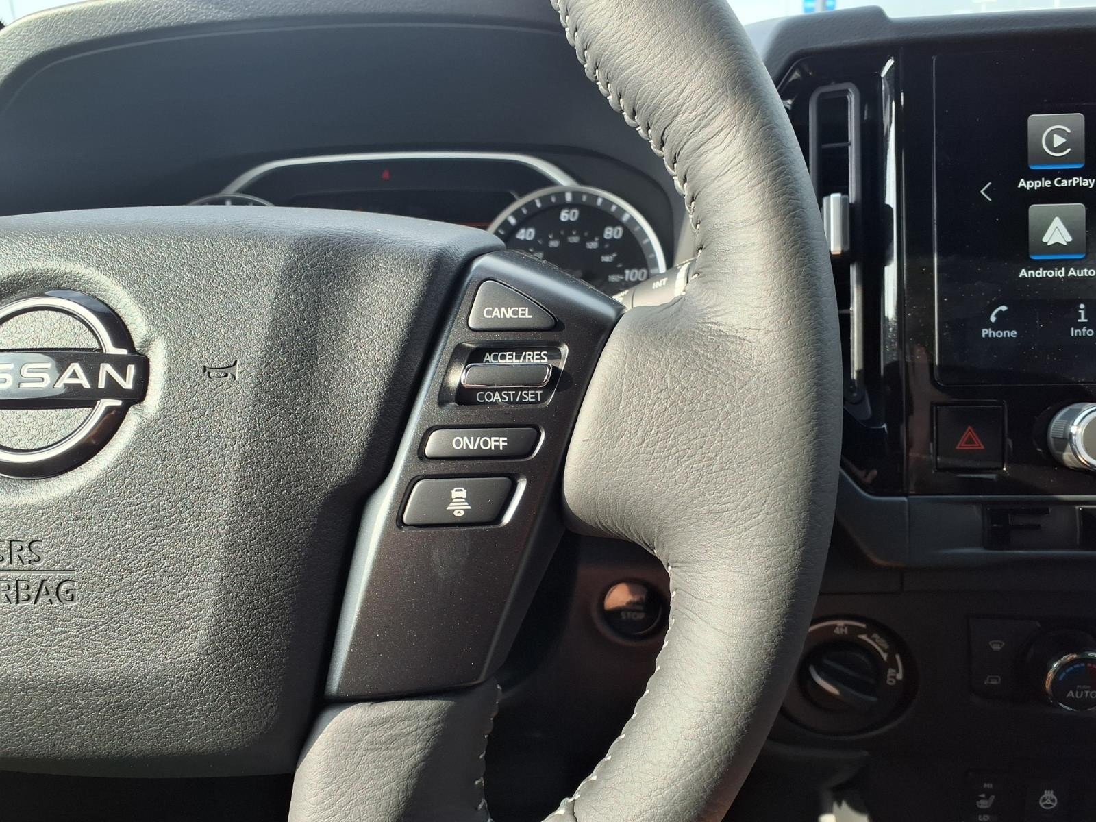 2026 Nissan Frontier SV Red at Robbins Nissan