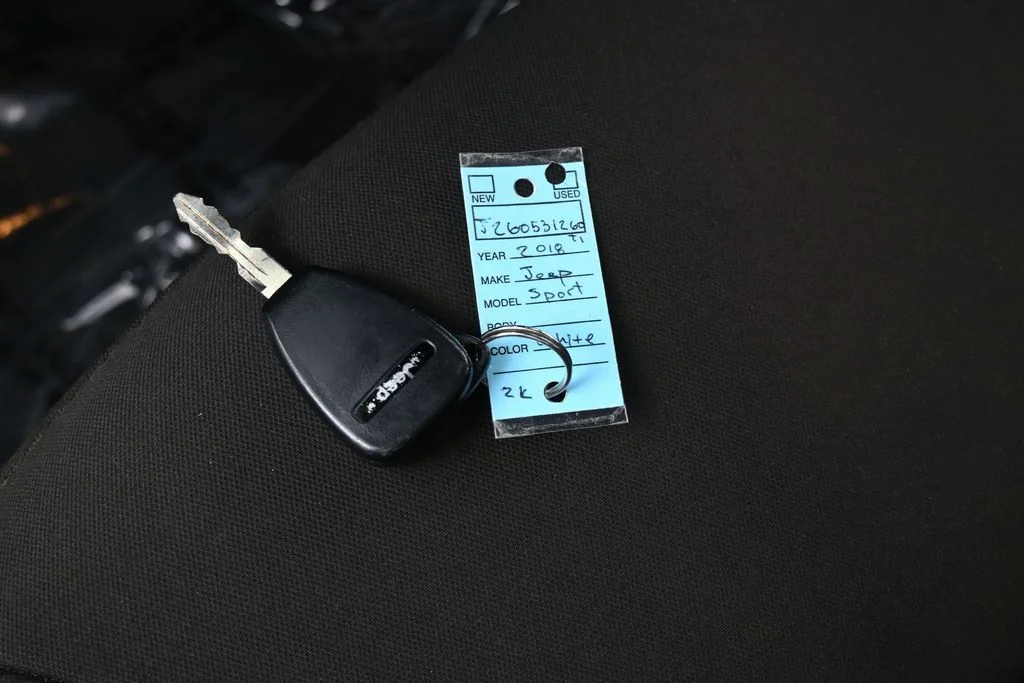 Used 2018 Bright White Clearcoat Jeep Unlimited Sport image 15