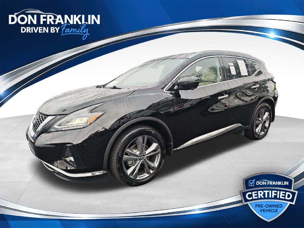 Used 2024 Black Nissan Platinum image 1