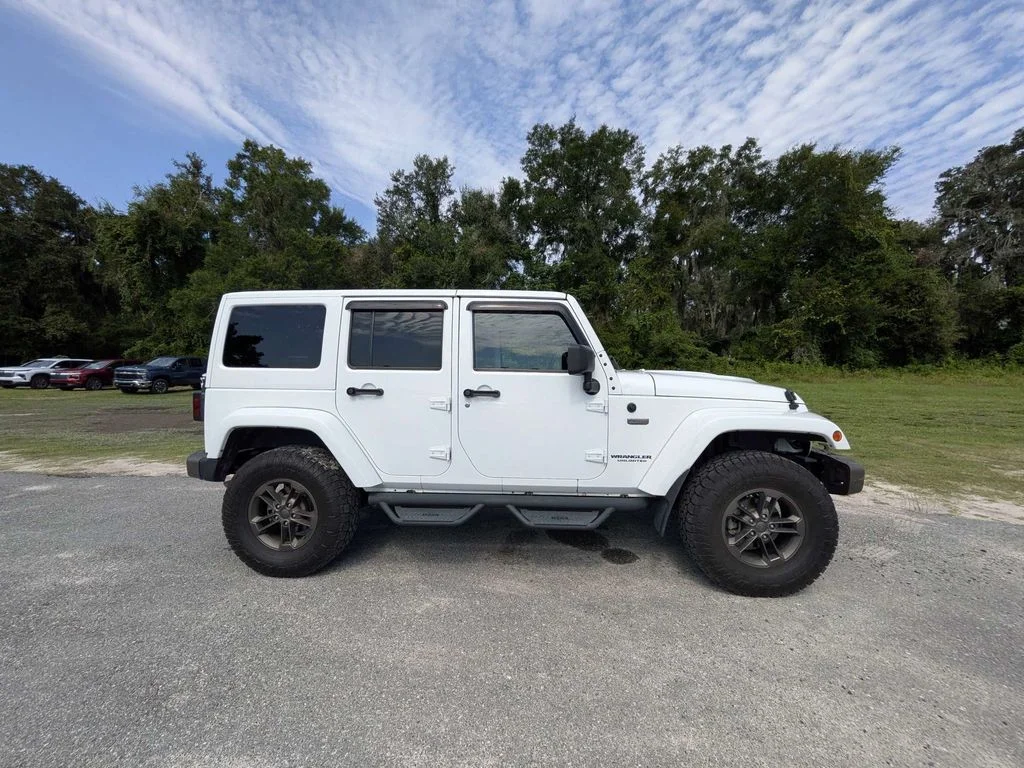 Used 2017 White Jeep Unlimited Sahara image 2