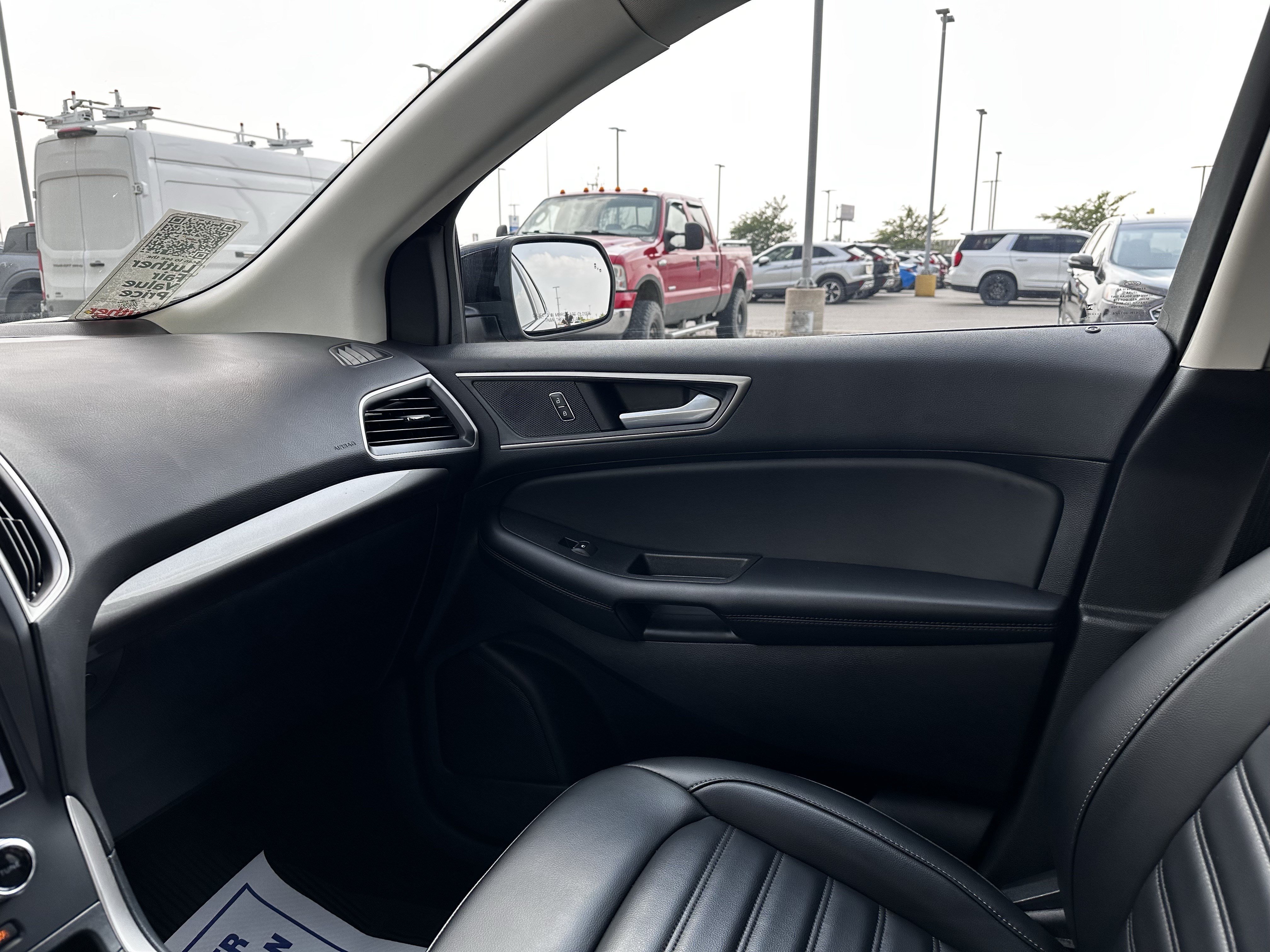 Used 2024 Agate Black Metallic Ford SEL image 11