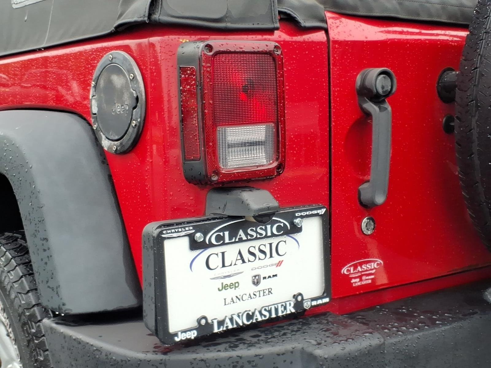 Used 2013 Flame Red Clearcoat Jeep Sport image 16