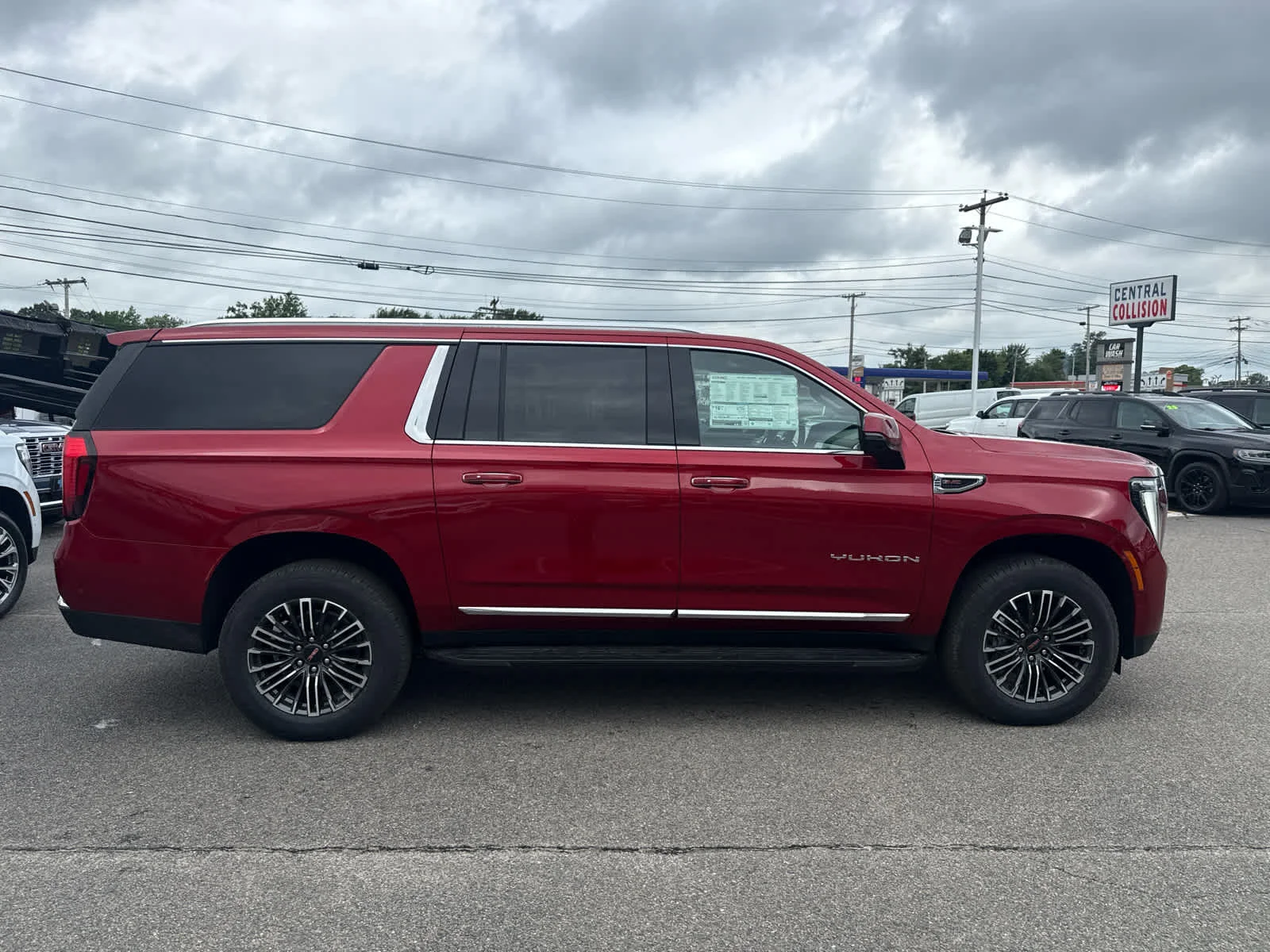 New 2026 Volcanic Red Tintcoat GMC Elevation image 6