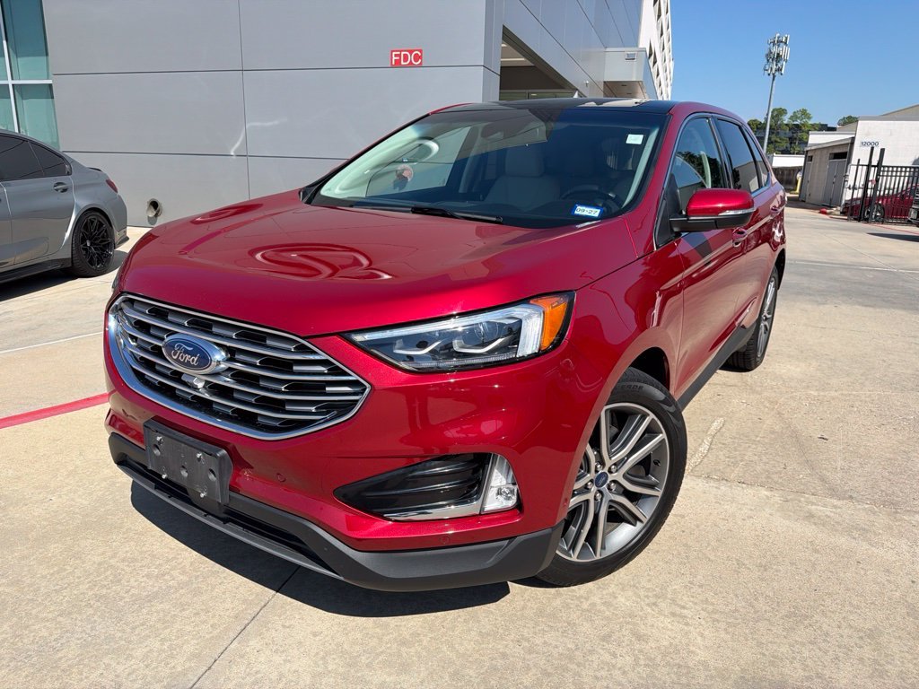 Used 2020 Red Metallic Ford Titanium image 1