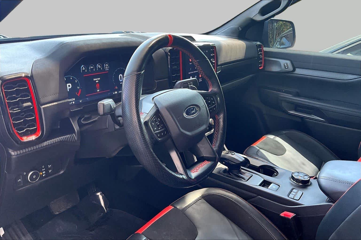 Used 2024 Velocity Blue Metallic Ford Raptor image 18