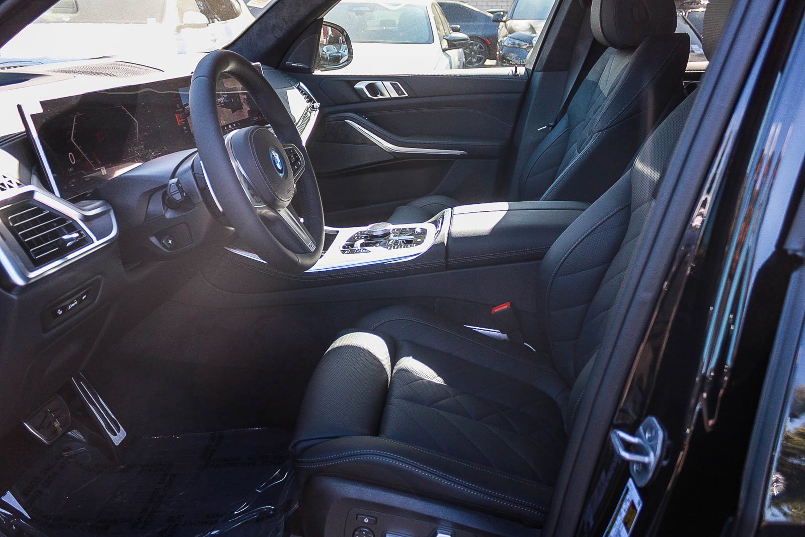 New 2026 Black Sapphire Metallic BMW xDrive50e image 17
