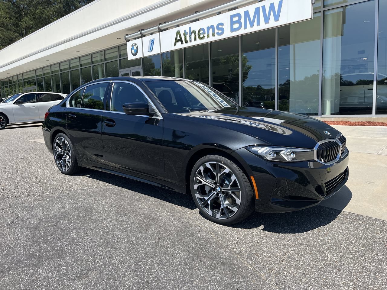 Used 2026 Black Sapphire Metallic BMW 330i xDrive image 2