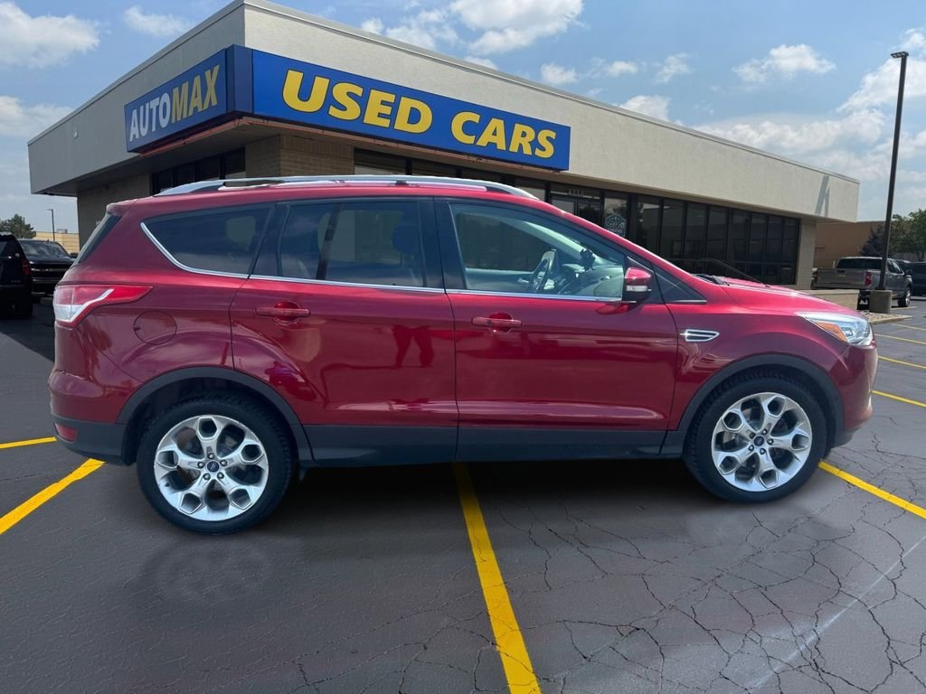 Used 2014 Ford Escape Titanium with VIN 1FMCU9J95EUB15014 for sale in Traverse City, MI