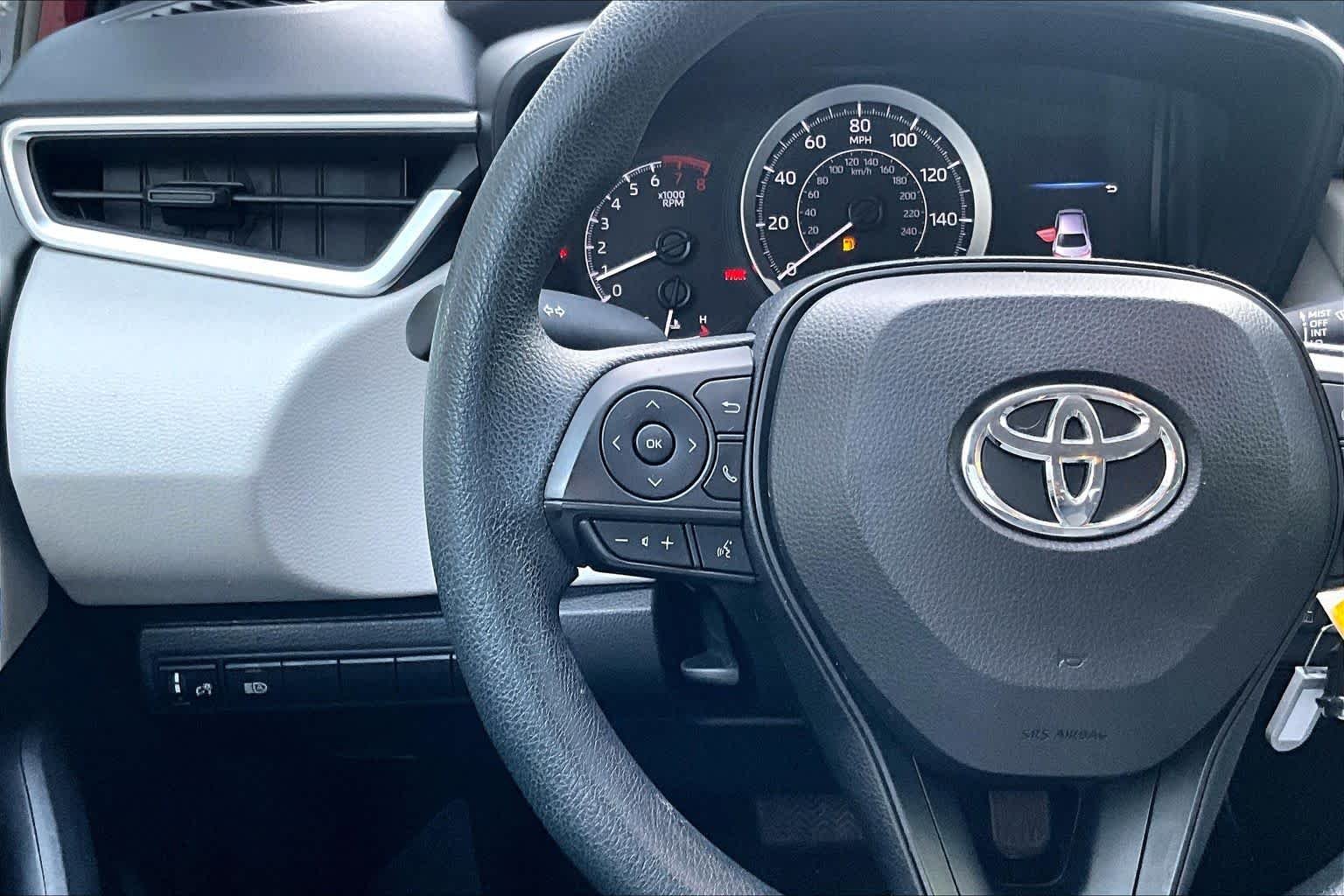 Used 2022 Ruby Flare Pearl Toyota LE image 24