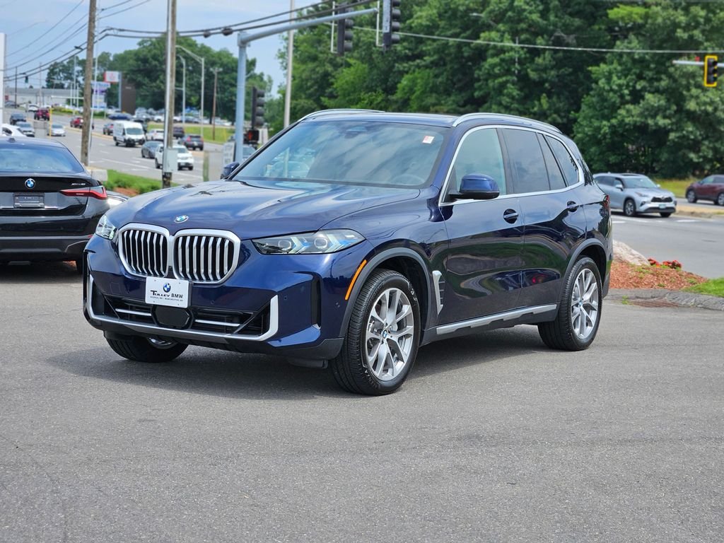 Used 2026 Tanzanite Blue II Metallic BMW xDrive40i image 3