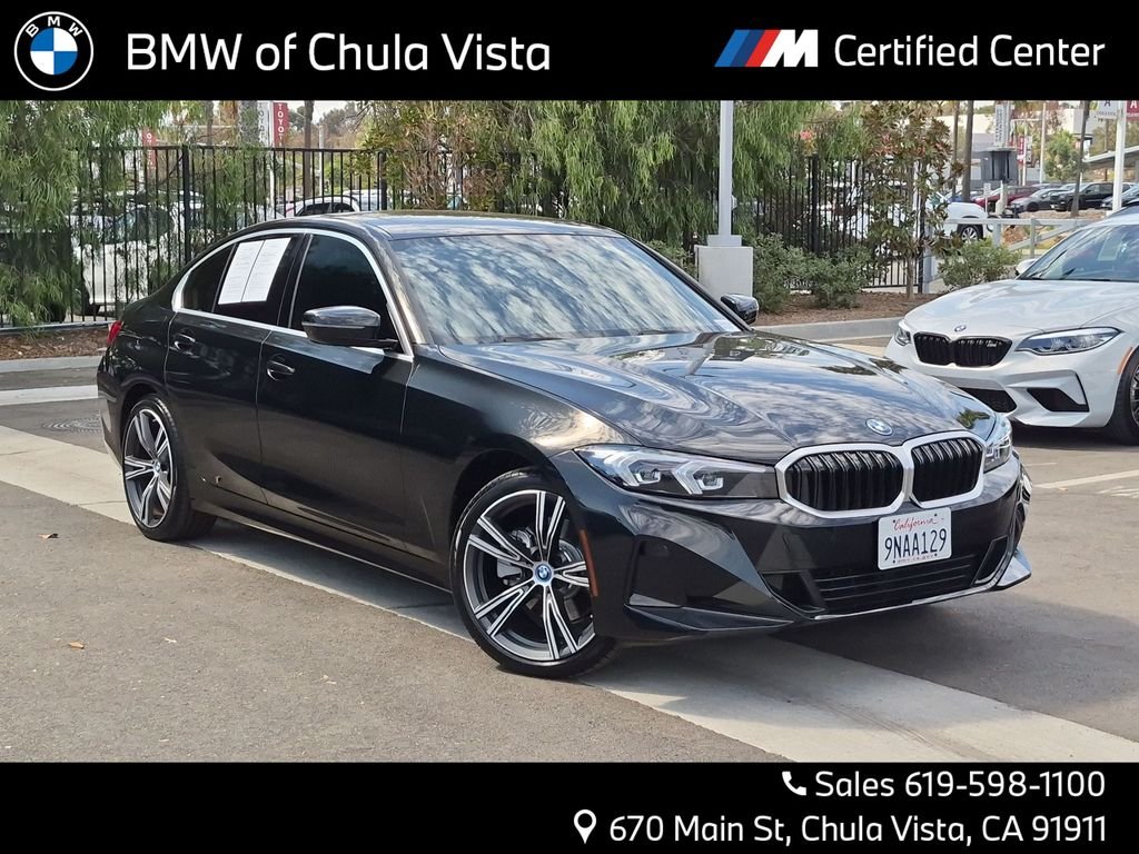 Used 2024 Black BMW 330e xDrive image 1