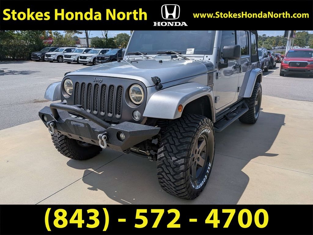 Used 2016 Silver Jeep Unlimited Sport S image 4
