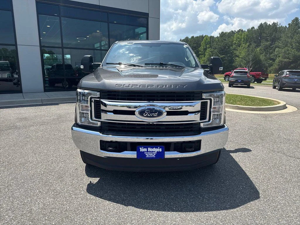 Used 2019 Magnetic Metallic Ford XLT 4WD Crew Cab 6.75 Box image 2