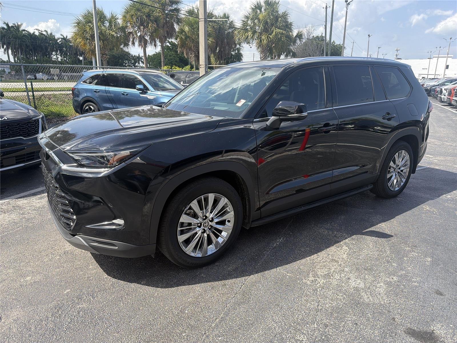Used 2025 Midnight Black Metallic Toyota Platinum image 1