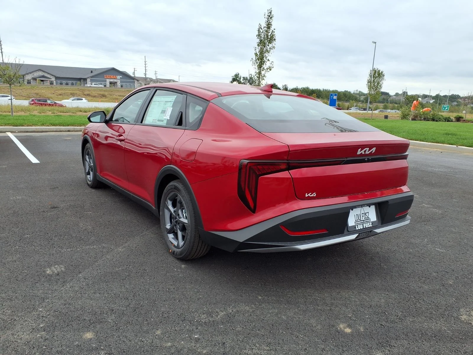 New 2026 Currant Red Kia LXS image 2