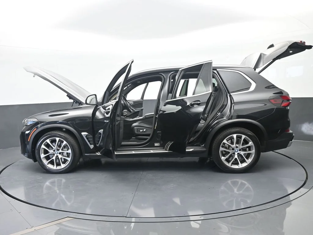 Used 2025 Black Sapphire Metallic BMW xDrive50e image 79