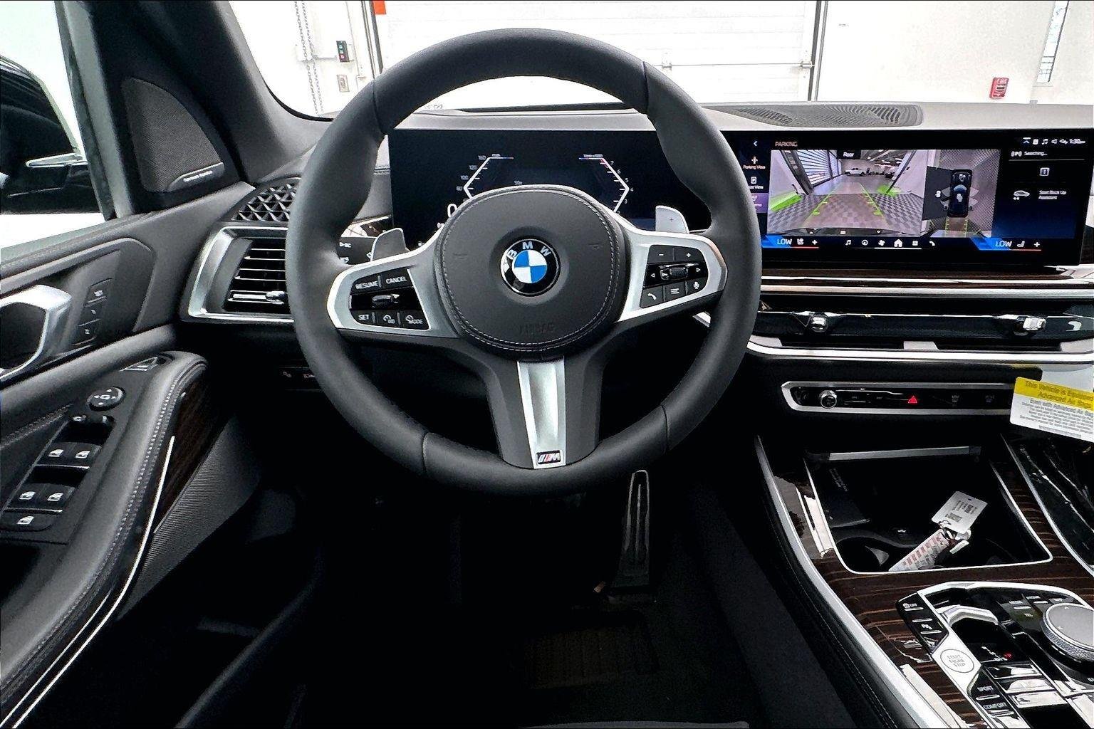 New 2026 Black Sapphire Metallic BMW xDrive40i image 11