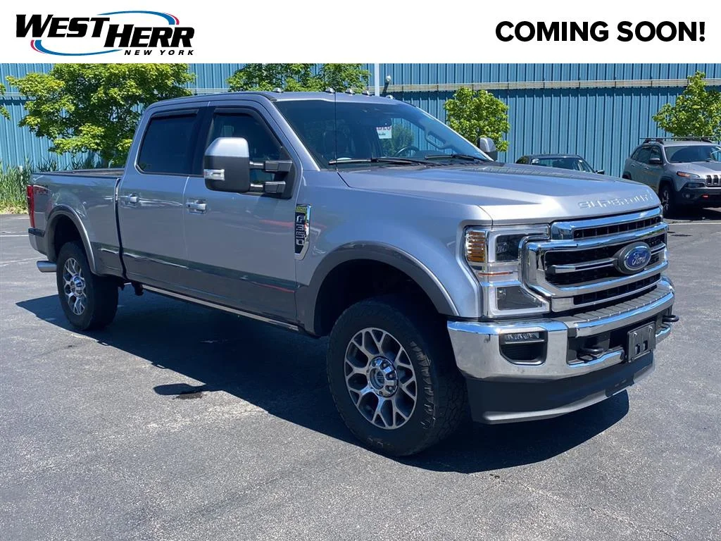 Used 2021 Iconic Silver/Carbonized Gray Ford Lariat image 1