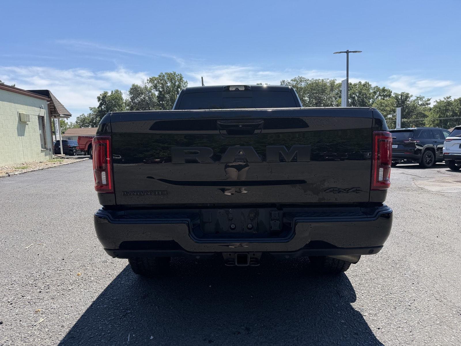Used 2025 Diamond Black Crystal Pearlcoat Ram Laramie image 6
