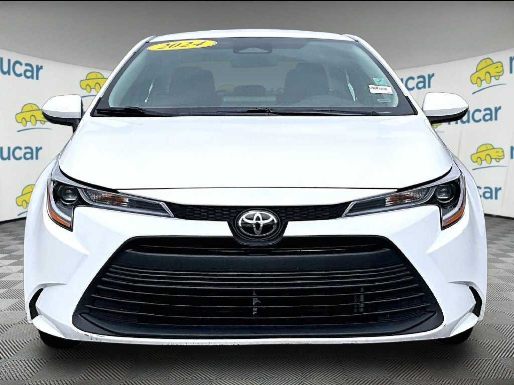 Used 2024 White Toyota LE image 2