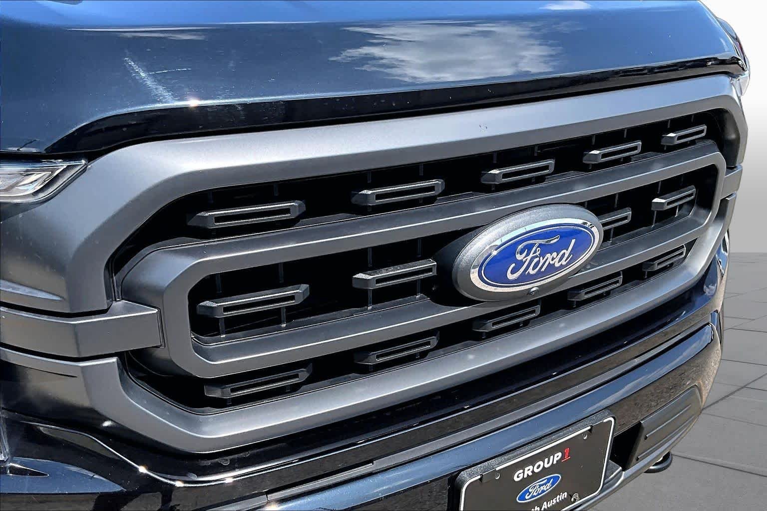 Certified Used 2023 Agate Black Metallic Ford XLT image 30