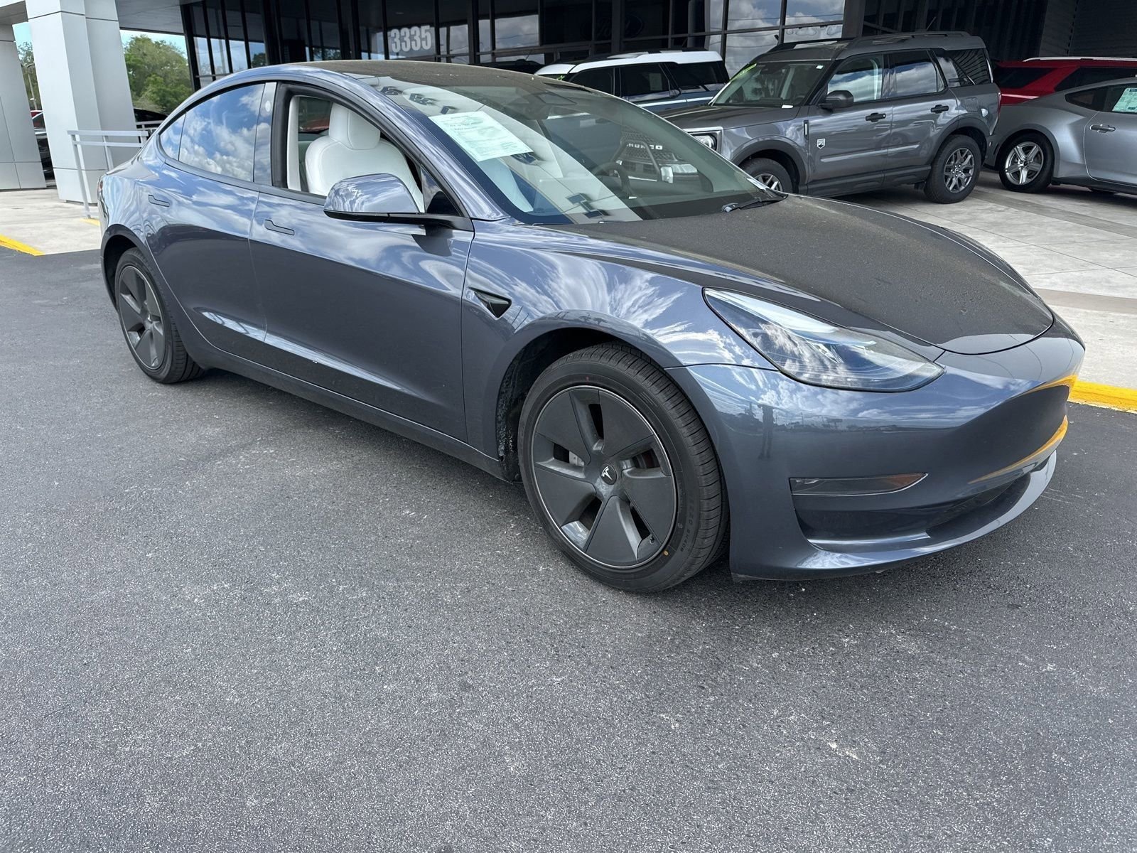Used 2023 Tesla Model 3 Base with VIN 5YJ3E1EA6PF657953 for sale in Spring Hill, FL