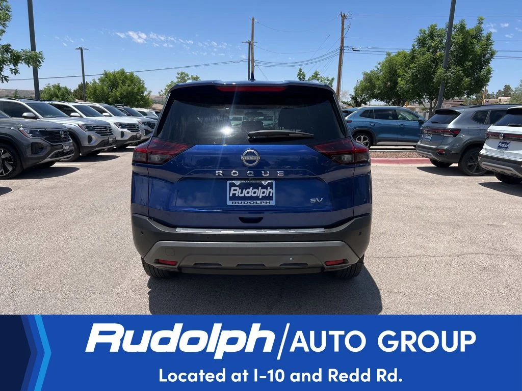 Used 2023 Caspian Blue Metallic Nissan SV image 7
