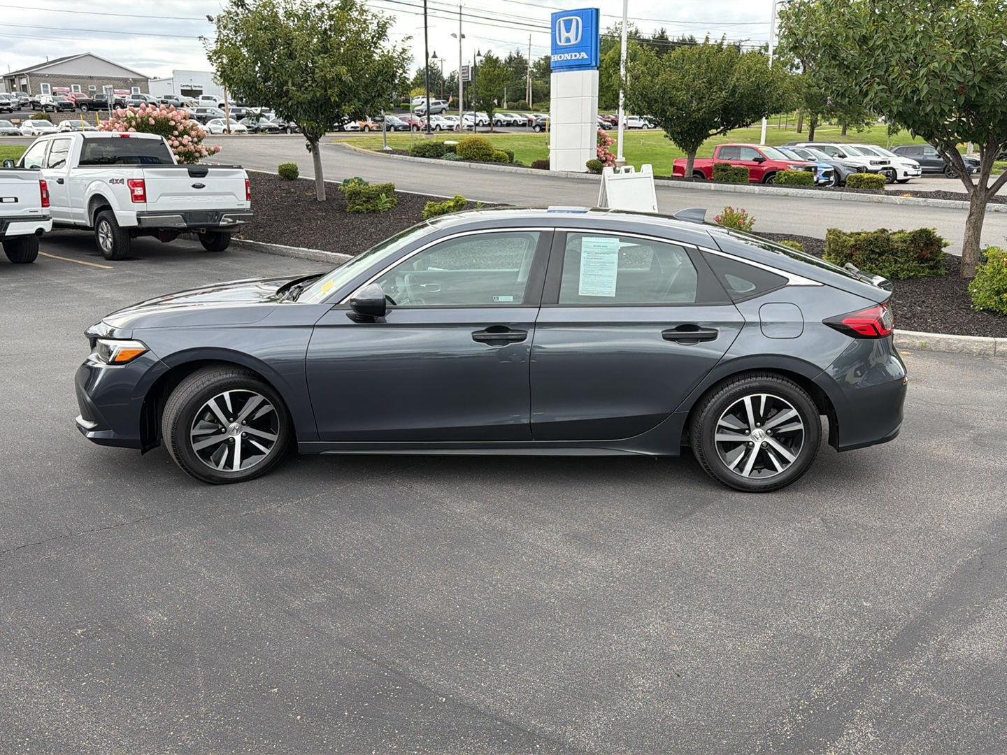Used 2024 Meteorite Gray Metallic Honda LX image 4
