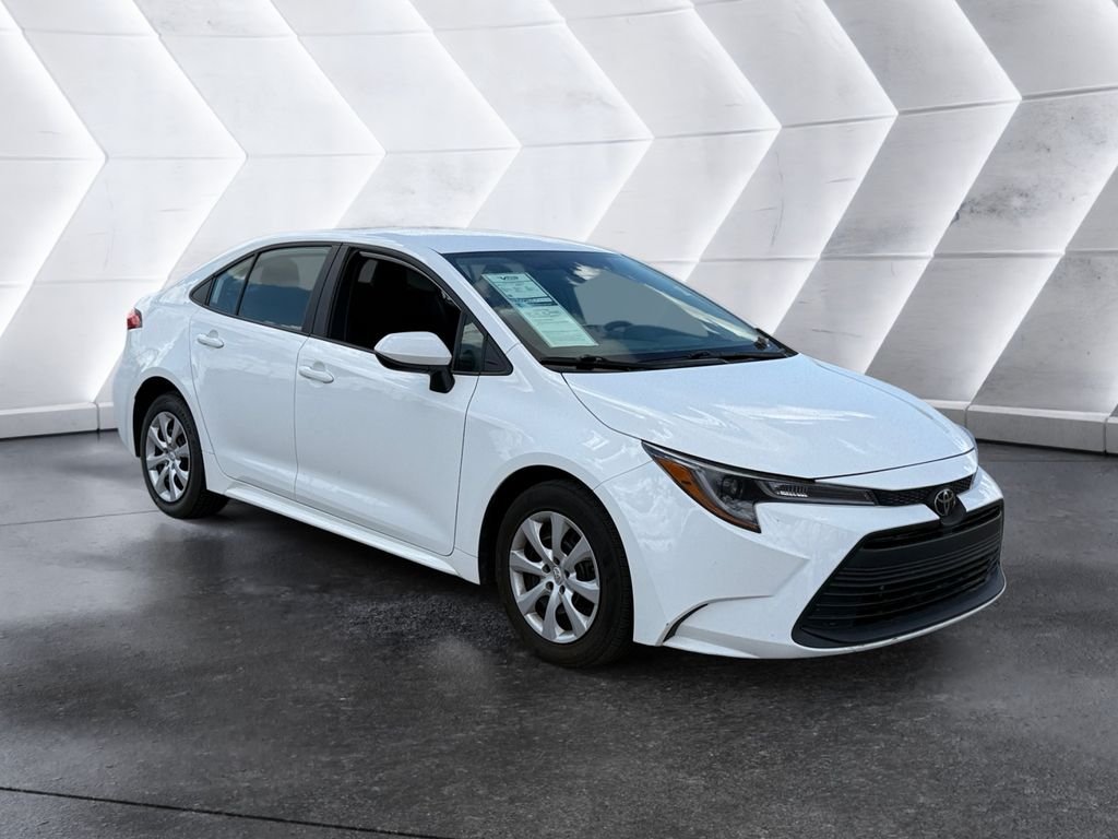 Used 2024 White Toyota LE image 1